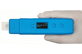 Handheld colloidal gold chromatography immunoassay reader